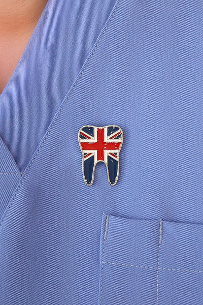 A beautiful pin in the featuring flag design of UK on a tooth shaped pin that can be pinned on scrub uniform, lab coat or backpack or etc.